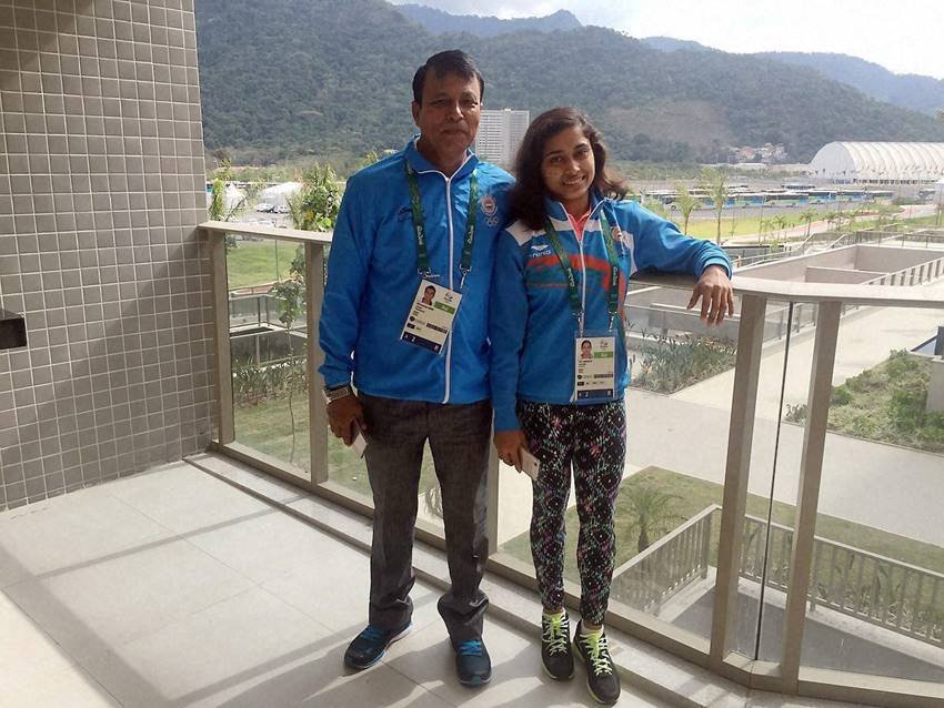 Dipa Karmakar and her coach arrives in Rio Dipa Karmakar, Dipa Karmakar birthday, Gymnast Dipa Karmakar, Dipa Karmakar latest news in hindi, Dipa Karmakar Olympics, Rio 2016 Olympics, Rio 2016, Dipa Karmakar Rio 2016, Dipa Karmakar profile, Dipa Karmakar record, Dipa Karmakar bio, Dipa Karmakar medal, Sports News