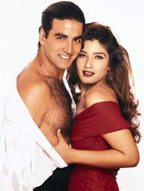 7245_akshay-kumar-without-shirt-with-raveena-tandon-in-red-sexy-top Raveena Tandon, Raveena Tandon films, Raveena Tandon birthday, Anil Thadani, Entertainment, Bollywood, Actor, Sunny deol, Ajey devgan, raveena tonodn love affair