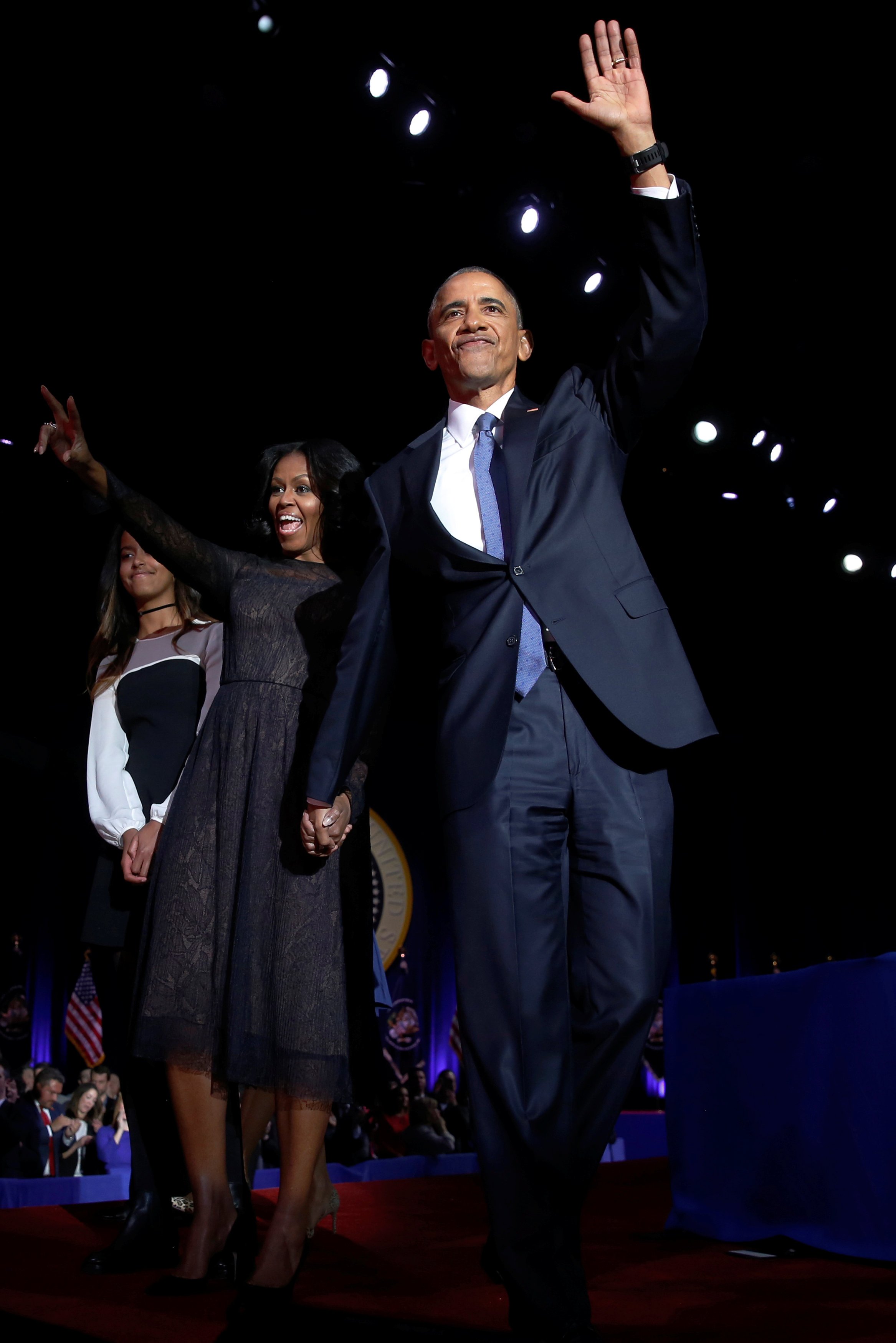 U.S. President Barack Obama (R) is joined onstage by first lady Michelle Obama and daughter Malia, after his farewell address in Chicago Obama, Barack Obama, Barack Obama cry, Barack Obama wipes away tears, Barack Obama farewell address, Barack Obama cries at farewell address, india news, jansatta, obama farewell photos, obama speech, obama last address