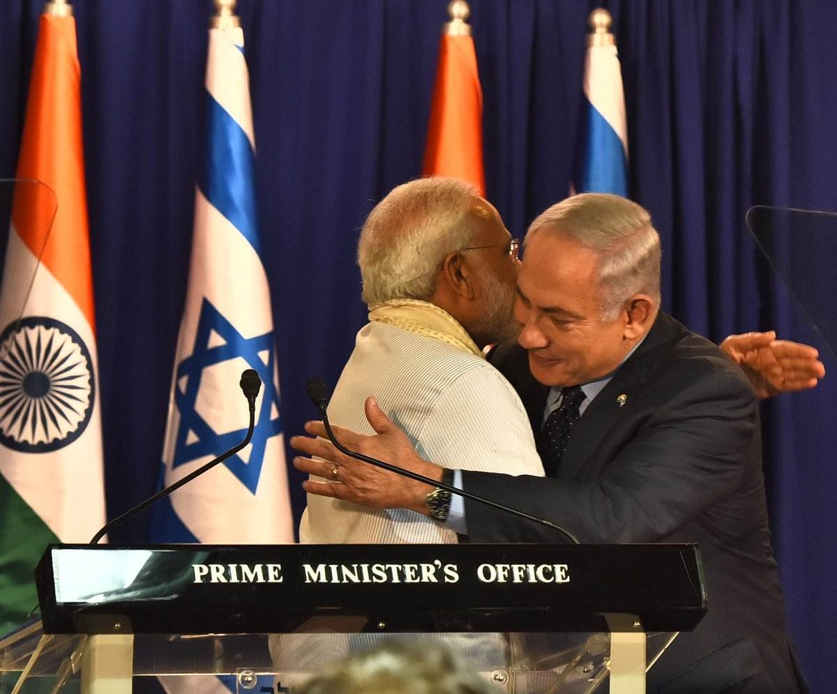 pm hug israel pm modi in israel, narendra modi, modi israel visit, modi netanyahu, benjamin netanyahu, india israel, india israel relations, india news