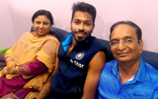 Hardik-Pandya-with-his-parents hardik pandya, hardik pandya birthday, hardik pandya videos, hardik pandya age, cricket news, sports news, Kunal Pandya, Hardika pandya bad days, Hardik pandya jansatta, hardik pandya debut match, hardik pandya shameful record, hardik pandyaphotos, hardik pandya gallery