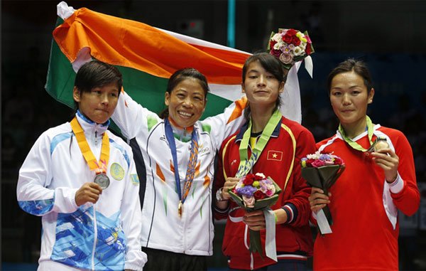 भारतीय मुक्केबाज एमसी मैरीकोम ने एशियाई खेलों के फ्लाईवेट वर्ग में आज यहां कजाखस्तान की झेइना शेकेरबेकोवा के खिलाफ पिछड़ने के बाद वापसी करते हुए मुकाबला जीतकर स्वर्ण पदक हासिल किया और वह यह कारनामा करने वाली पहली भारतीय महिला मुक्केबाज बन गईं।