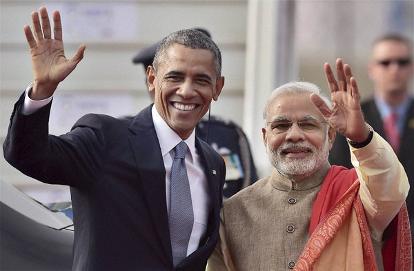 Obama Modi: वह विभिन्न रणनीतिक मुद्दों पर प्रधानमंत्री मोदी के साथ बातचीत करेंगे, जिनमें असैन्य परमाणु संधि को लागू करने से जुड़े अवरोध तोड़ना और रक्षा एवं आर्थिक संबंध बढ़ाना शामिल है। (स्रोत-पीटीआई)