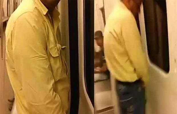 metro video, delhi metro video, man peeing metro, delhi metro man peeing, metro man peeing, man peeing video, man peeing delhi metro, delhi news