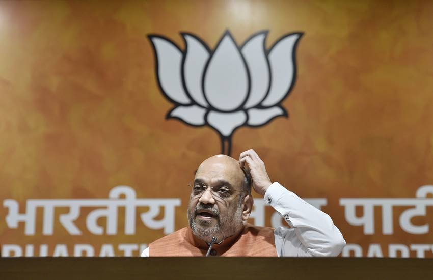 भारतीय जनता पार्टी के मुख्‍यालय पर आयोजित प्रेस कॉन्फ्रेंस में पार्टी अध्‍यक्ष अमित शाह। (Photo: PTI)
