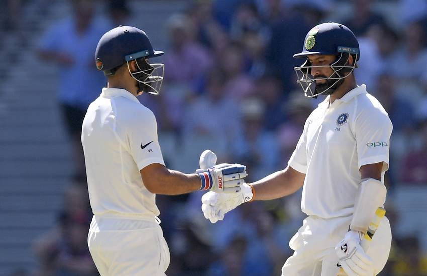 विराट कोहली और चेतेश्‍वर पुजारा। (Photo : PTI)