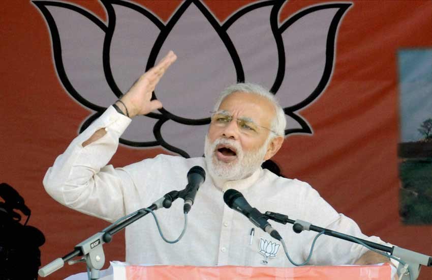 चुनावी रैली को संबोधित करते प्रधानमंत्री नरेंद्र मोदी। (पीटीआई फोटो)