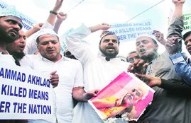 india, america, narendra modi, baraq obama, ghar wapsi, communal clash, minority, report