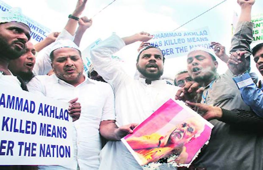 india, america, narendra modi, baraq obama, ghar wapsi, communal clash, minority, report