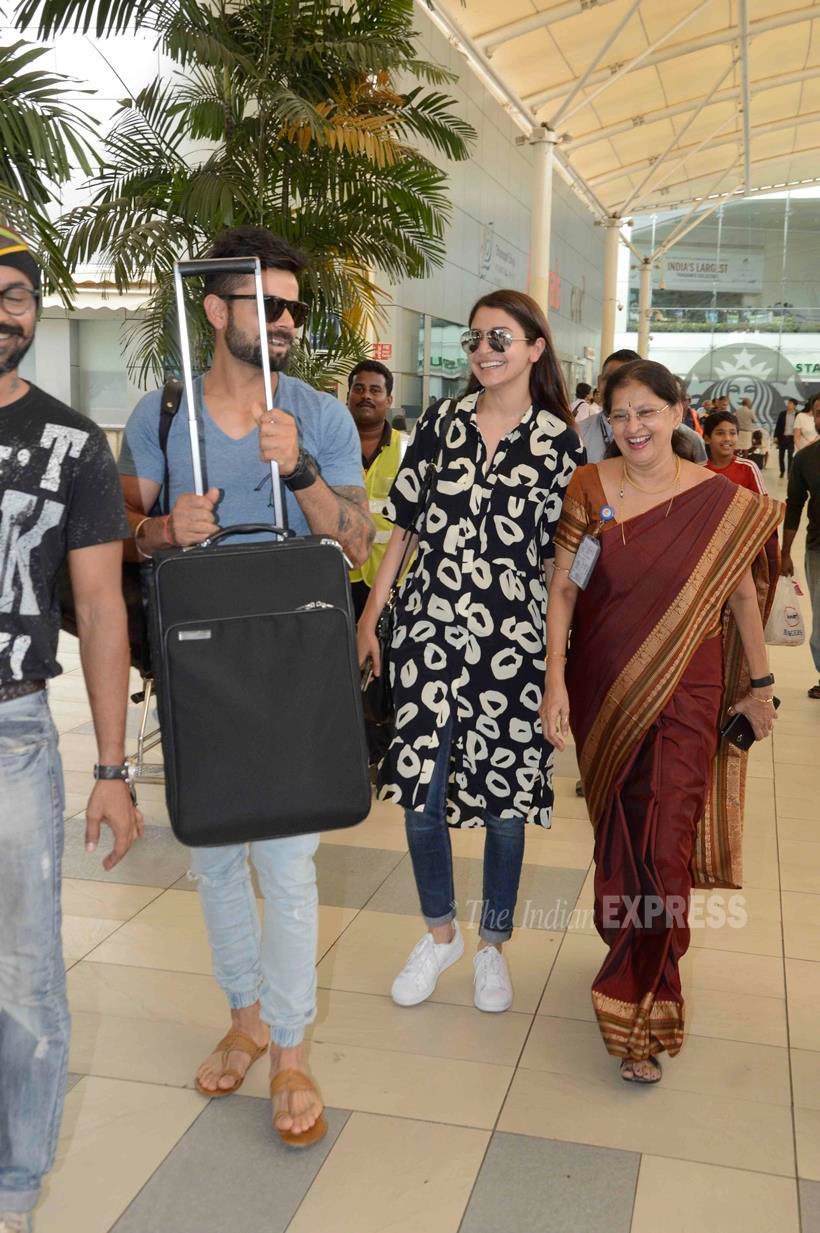 Virat kohli, anushka sharma, madhuri dixit, mumbai airport, kapil sharma, varun dhawan, bollywood starts spot at airport, bollywood stars photos, virat-anuska latest photos