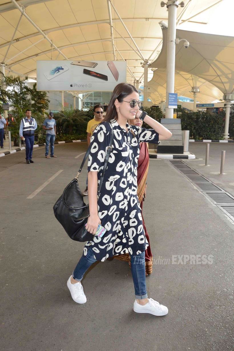 Virat kohli, anushka sharma, madhuri dixit, mumbai airport, kapil sharma, varun dhawan, bollywood starts spot at airport, bollywood stars photos, virat-anuska latest photos