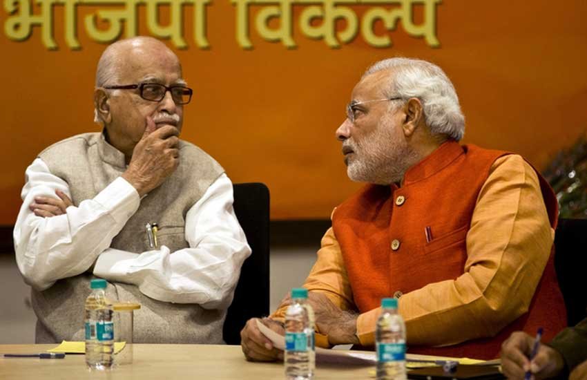 भाजपा के वरिष्ठ नेता लालकृष्ण आडवाणी के साथ प्रधानमंत्री नरेंद्र मोदी। (पीटीआई फाइल फोटो) भाजपा के वरिष्ठ नेता लालकृष्ण आडवाणी के साथ प्रधानमंत्री नरेंद्र मोदी। (पीटीआई फाइल फोटो)