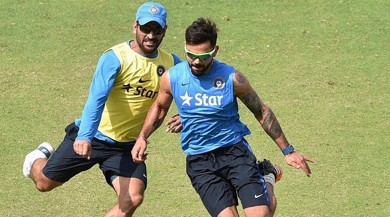 Mohali: Indian players M S Dhoni and Virat Kohli during a training session in Mohali on Saturday. PTI Photo by Shahbaz Khan (PTI3_26_2016_000137B)