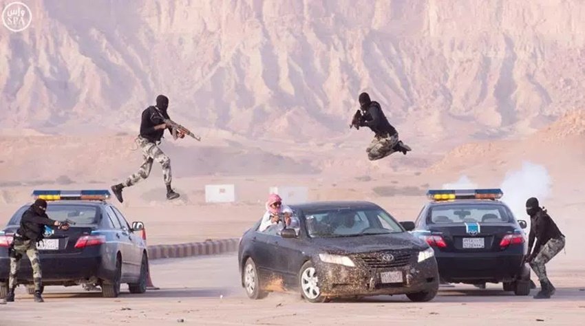top photos of the 2016, photo of the year 2016, international photos, wolrd photos, Saudi security forces, military exercise, west of Riyadh, Saudi Arabia, barack obama daughter malia, barack obama malia pics, heavy rains in peshawar, floods in peshawar, top frames, top photos, photos of the year, top frames of the 2016, Villarrica Volcano, white-tailed eagle, Khrapkov, "Photos Of The Year, Vladimir Putin workout, Mark Zuckerberg daughter, Barack Obama selfie, photo gallery of the year, picture of Jayalalithaa, Brazil President, Dilma Rousseff, German Chancellor, Angela Merkel, US President, Barack Obama, Charlie Hebdo shootings, Rohingya Bangladeshi migrants, Palestinian protester, nepal Earthquake, 100 lashes, Hungarian police, Syrian refugee, French President, Francois Hollande 2015 की तस्‍वीरें, बेहतरीन तस्‍वीरें