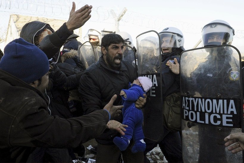 top photos of the 2016, photo of the year 2016, international photos, wolrd photos, Saudi security forces, military exercise, west of Riyadh, Saudi Arabia, barack obama daughter malia, barack obama malia pics, heavy rains in peshawar, floods in peshawar, top frames, top photos, photos of the year, top frames of the 2016, Villarrica Volcano, white-tailed eagle, Khrapkov, "Photos Of The Year, Vladimir Putin workout, Mark Zuckerberg daughter, Barack Obama selfie, photo gallery of the year, picture of Jayalalithaa, Brazil President, Dilma Rousseff, German Chancellor, Angela Merkel, US President, Barack Obama, Charlie Hebdo shootings, Rohingya Bangladeshi migrants, Palestinian protester, nepal Earthquake, 100 lashes, Hungarian police, Syrian refugee, French President, Francois Hollande 2015 की तस्‍वीरें, बेहतरीन तस्‍वीरें
