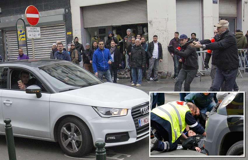Muslim woman, mown, anti Islam rally, Brussels district, Molenbeek, isis, islamic state in beljium, trouble in brussels