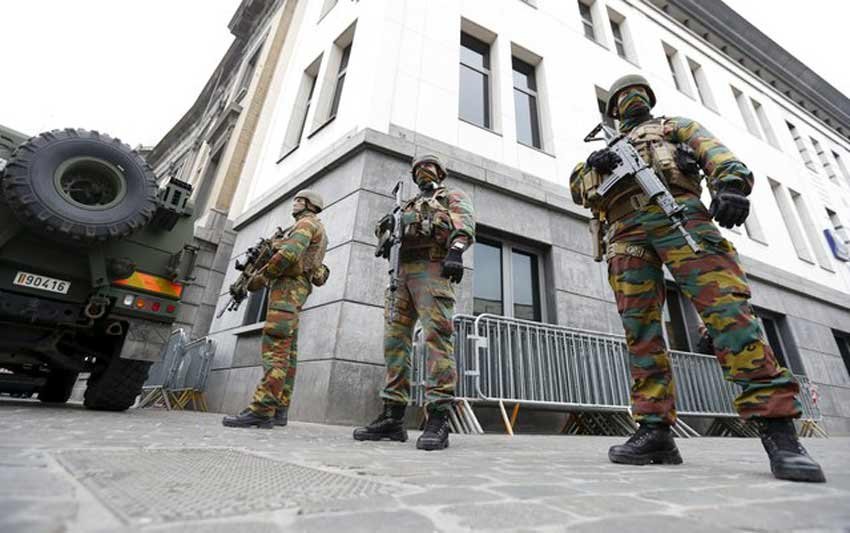 Muslim woman, mown, anti Islam rally, Brussels district, Molenbeek, isis, islamic state in beljium, trouble in brussels