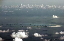 South China Sea, china, chinese military, chinese military aircraft, chinese military aircraft lands, chinese military aircraft landing, south china sea aircraft, south china sea landing, china warplanes, world news