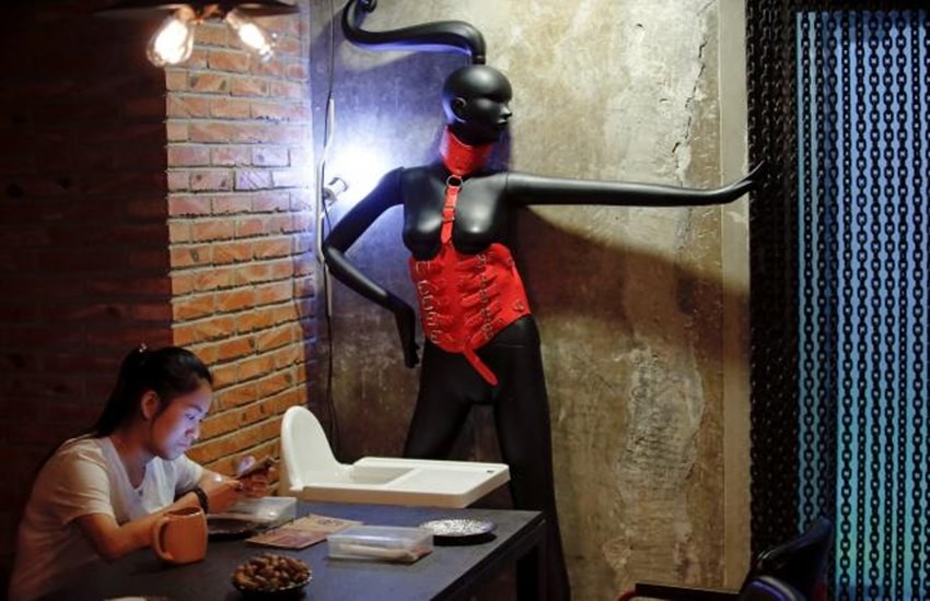 fetish,Beijing fetish restaurant,lobster and sex,breast-shaped cups,bottle openers,wooden penis,Beijing S&M restaurant,food with sex,divorcee,seafood,mannequins,bondage gear,Horny,Sensuous World,basic desires of humans,taboo