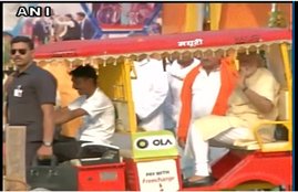 modi, e-rickshaw, modi e rickshaw ride, modi on e rickshaw, pm modi, modi in varanasi, varanasi