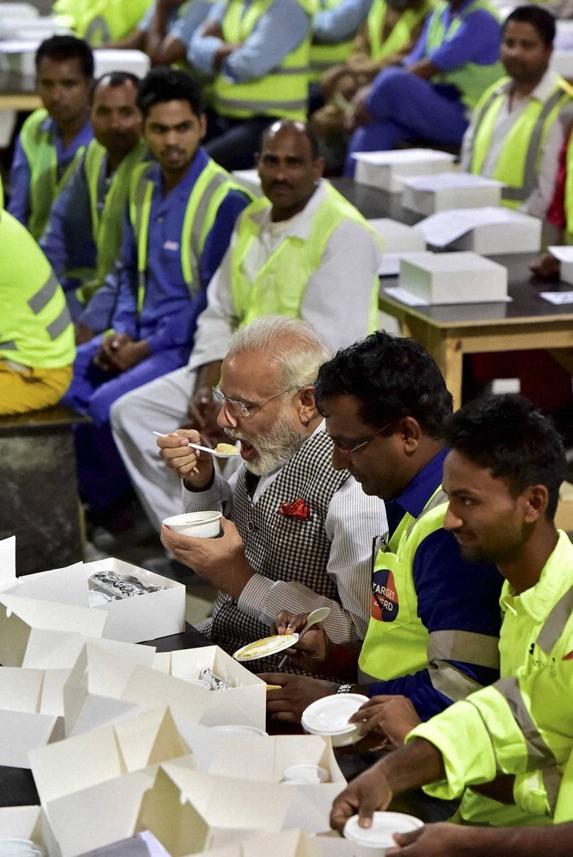 Narendra Modi in Doha, Narendra Modi Latest news, Modi meal with workers, Modi Doha News, Modi Meal Workers, Narendra Modi in Qatar