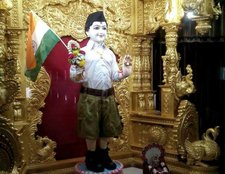 Congress,RSS , Lord Swaminarayan idol dressed in RSS uniform sparks a row,news, India news