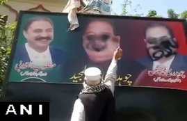 pakistan, pakistan occupied kashmir, kashmir, PoK, PoK election, rigged elections, pakistan flag burn, nawaz sharif