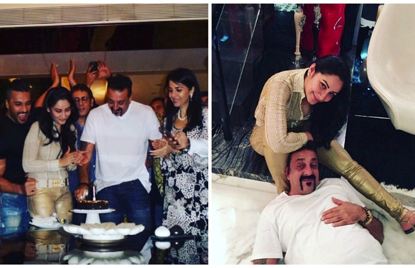 57वें बर्थडे पर केक काटते संजय दत्त।