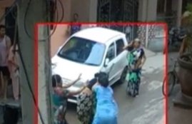 women hitting, women stonning, cctv video women hitting