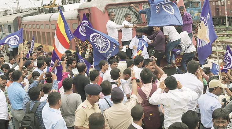 dalit, dalit beaten, karnataka dalit beaten, dalit protest, incidents of dalit violence, caste system, who is dalit, bajrang dal, beef rumour