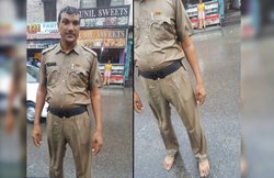 बारिश में नंगे पांव ड्यूटी करते हरियाणा के इस पुलिसवाले की तस्वीरें वायरल