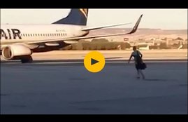 Ryanair, ryanair flights, ryanair flights madrid, ryanair passenger, passenger chasing plane on runway, Ryanair Passenger Chasing Plane on Runway