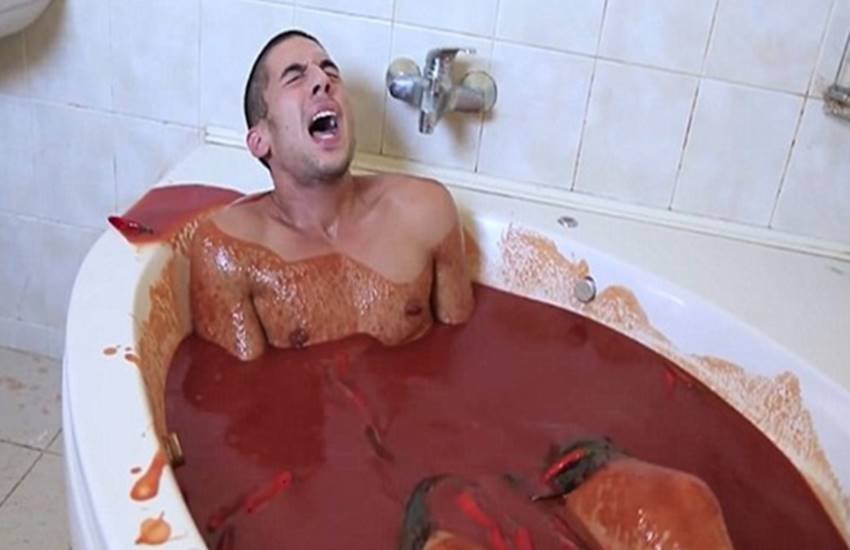 Cemre Candar, man bathing in chilly sauce