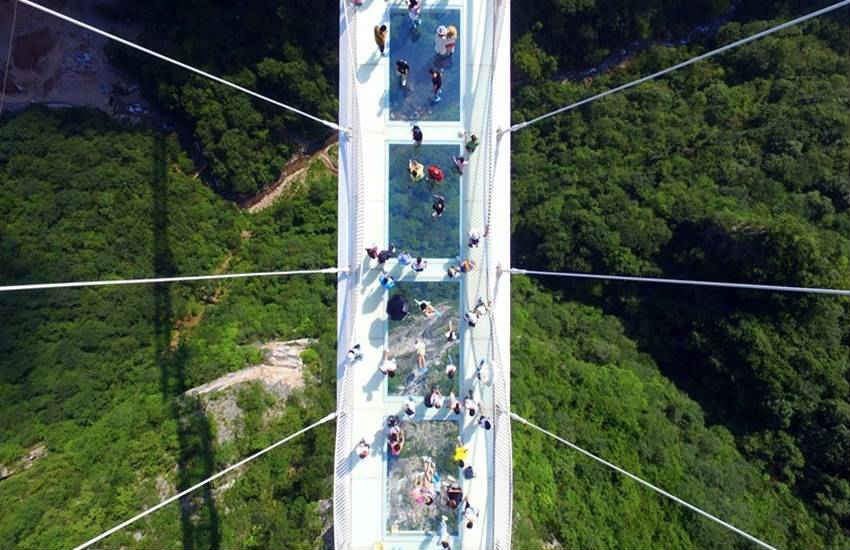 china, china glass bridge, china glass bottom bridge, china glass skywalk, Zhangjiajie china, Zhangjiajie park glass bridge, longest and highest bridge, world lonest and highest bridge, Zhangjiajie park glass bridges, china news, latest news, trnding news, china glass bride photos, Zhangjiajie glass bridge photos