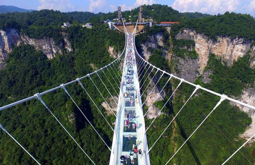 china, china glass bridge, china glass bottom bridge, china glass skywalk, Zhangjiajie china, Zhangjiajie park glass bridge, longest and highest bridge, world lonest and highest bridge, Zhangjiajie park glass bridges, china news, latest news, trnding news, china glass bride photos, Zhangjiajie glass bridge photos