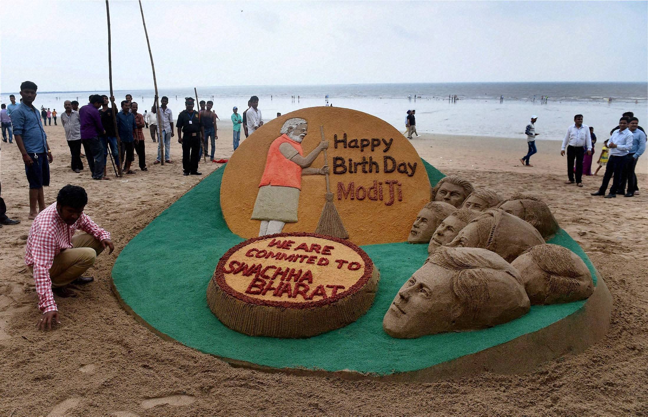 narendra modi, narendra modi birthday, pm narendra modi, pm modi, narendra modi gujarat, pm modi birthday, india news narendra modi birthday cake, modi photos, pm modi birthhday photos