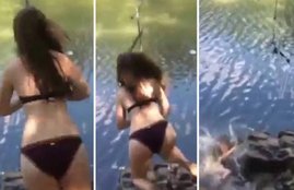 bikini-clad girl, crashes onto ROCKS, viral video