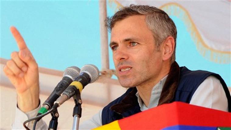 Baramulla: Jammu and Kashmir Chief Minister Omar Abdullah addresses an election campaign rally for National Conference candidate Sharifuddin Shariq at Rafiabad in Baramulla district on Tuesday. PTI Photo (PTI4_29_2014_000183A)