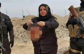 Iraq housewife fights ISIS, Wahida Mohamed, Um Hanadi, ISIS, female fighters, islamic states, Abu Bakr al-Baghdadi, weapon