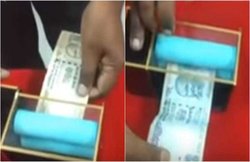 500-1000 के अवैध नोटों को धड़ाधड़ 100-100 के नोटों में बदल देती है मशीन, वायरल हुआ वीडियो