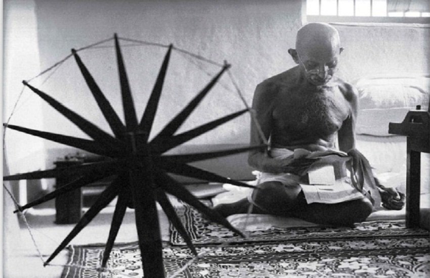 mahatma gandhi image with wheel by Margaret Bourke-White