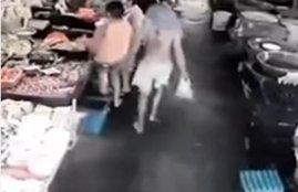 Accused grabs female on the backside in supermarket, woman kicked him