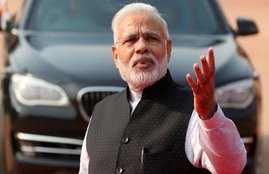 Narendra Modi, PM Modi Chair, Prime Minister, Lucky Chair, Modi in kanpur, Loksabha Elections, Loksabha 2014, Parivartan Sabha, Thaggu ke laddu, India, Jansatta