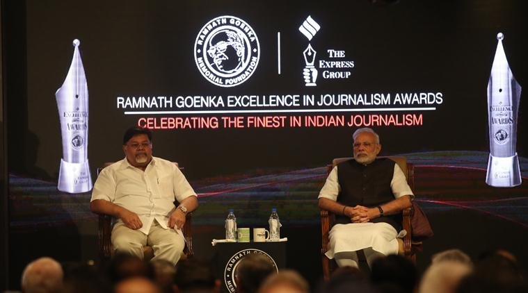 PM Narendra Modi and Express Group CMD Viveck Goenka at the Ramnath Goenka journalism awards in the capital New Delhi on wednesday. Express Photo by Tashi Tobgyal New Delhi 021116