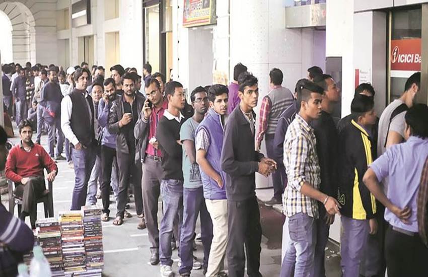 demonetisation, cash crunch, atm rush, no money, delhi atm rush, delhi bjp, bjp give laddoo, bjp give sweet, digital, digital payment, cashless economy, no money, online payment, online transaction, BJP, rs 500 ban, rs 1000 ban, mp cash crunch, narendra modi, pm modi, india news