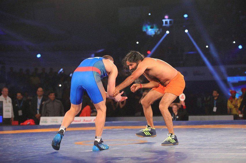 baba ramdev, yoga guru baba ramdev, baba ramdev wrestling, ramdev vs andrey stadnik, andrey stadnik vs baba ramdev, pro wrestling, pwl 2, pwl news, Olympic medallist Andrey Stadnik, Pro Wrestling League