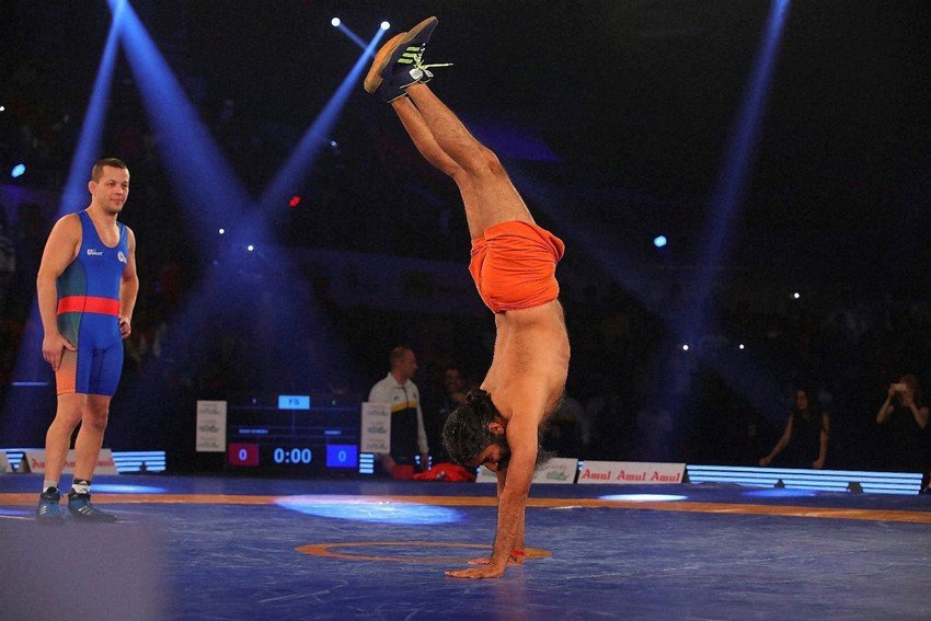 baba ramdev, yoga guru baba ramdev, baba ramdev wrestling, ramdev vs andrey stadnik, andrey stadnik vs baba ramdev, pro wrestling, pwl 2, pwl news, Olympic medallist Andrey Stadnik, Pro Wrestling League