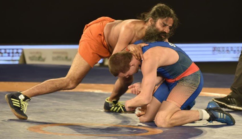 baba ramdev, yoga guru baba ramdev, baba ramdev wrestling, ramdev vs andrey stadnik, andrey stadnik vs baba ramdev, pro wrestling, pwl 2, pwl news, Olympic medallist Andrey Stadnik, Pro Wrestling League