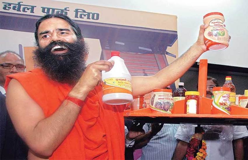 बाबा रामदेव अपने पतंजलि प्रॉडक्ट्स के साथ। (File Photo) बाबा रामदेव अपने पतंजलि प्रॉडक्ट्स के साथ। (File Photo)
