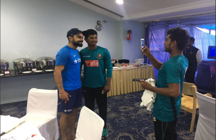 indian captain virat kohli, indian captain virat kohli batting, bangladeshi junior team, virat kohli with junior team, india vs bangladesh, भारतीय टीम, बांग्लादेशी टीम, विराट कोहली